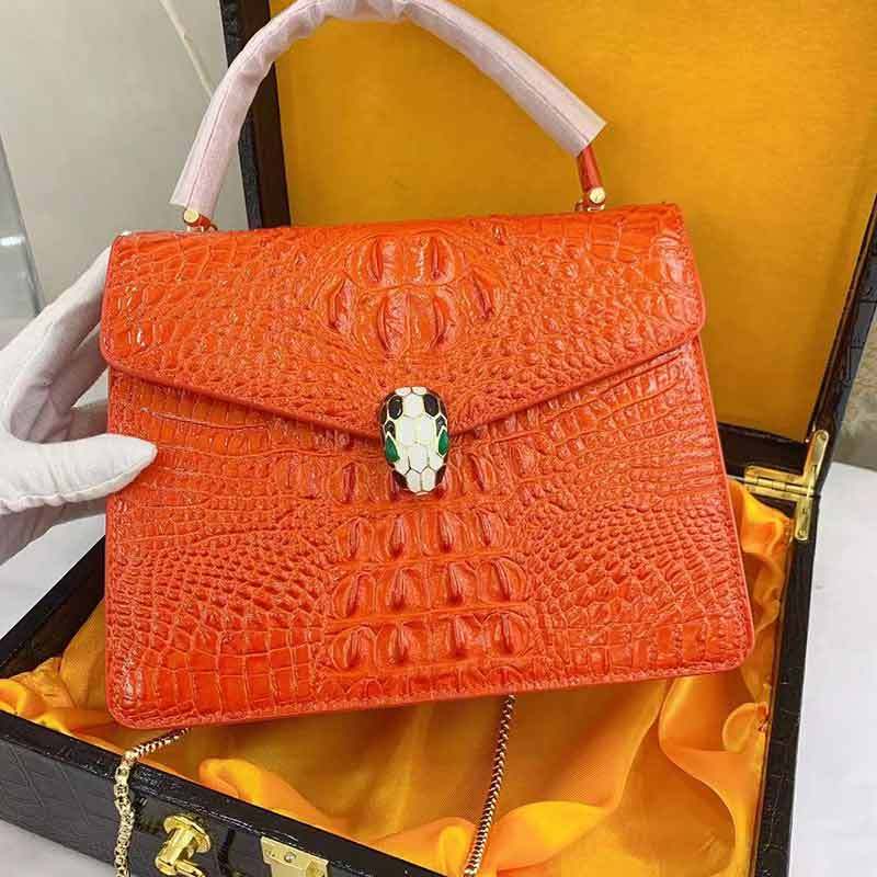 布休依-泓凯-进口小牛皮鳄鱼纹时尚手提包·橙色