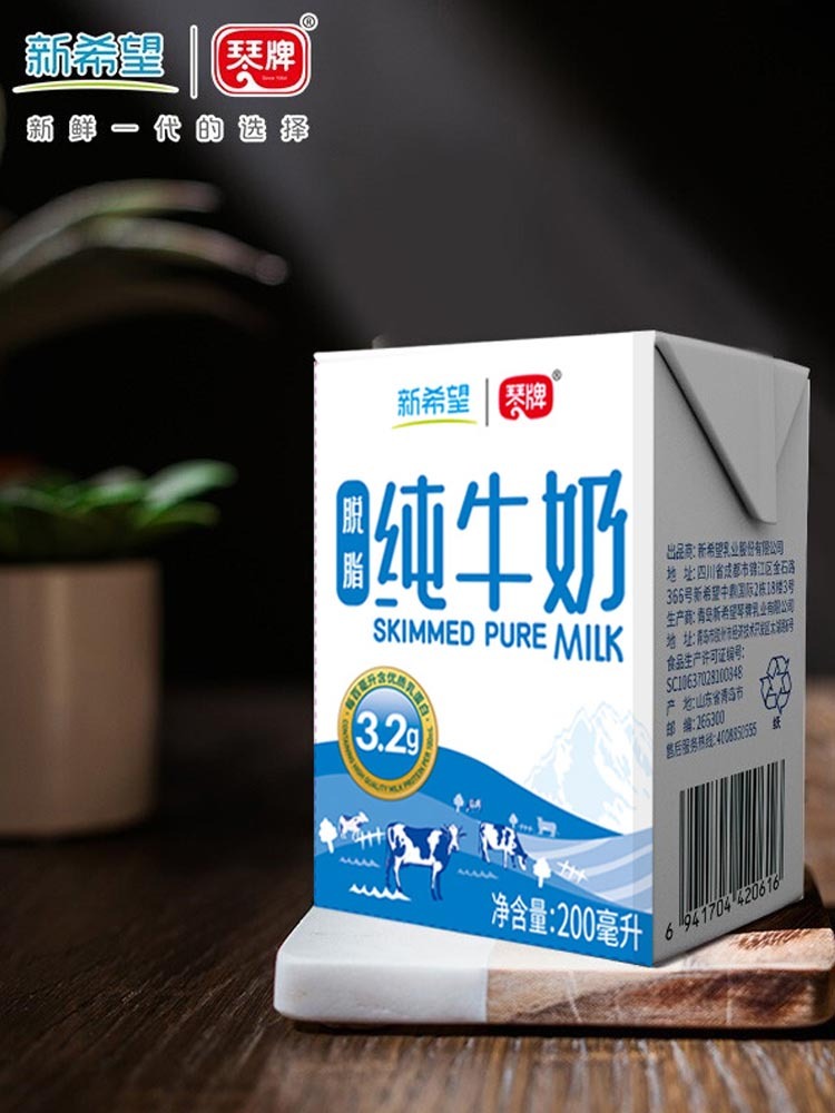 新希望琴牌脱脂纯牛奶200ml*24盒