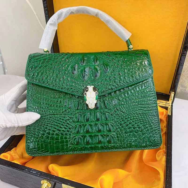 布休依-泓凯-进口小牛皮鳄鱼纹时尚手提包·绿色