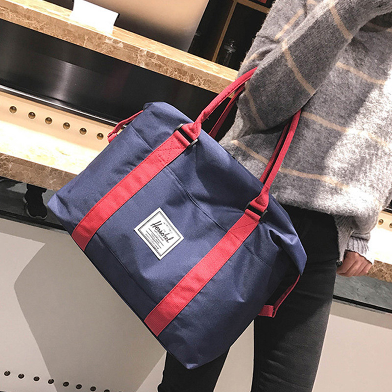 (特价款)时尚撞色男女通用大容量手提行李短途旅行时尚休闲包·蓝色