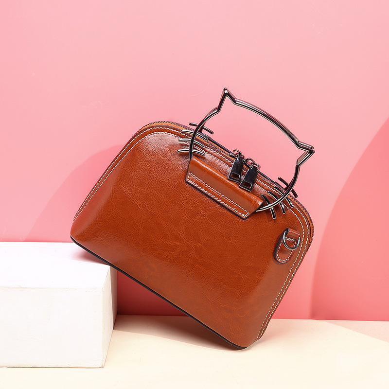 搭歌2019夏新款潮流牛皮时尚金属手提单肩斜挎可爱小猫女式小包610429