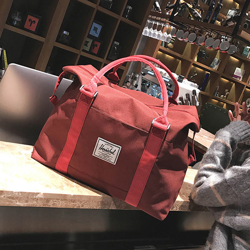 (特价款)时尚撞色男女通用大容量手提行李短途旅行时尚休闲包·红色